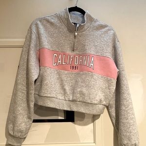 Grey and pink cropped half zip sweatshirt